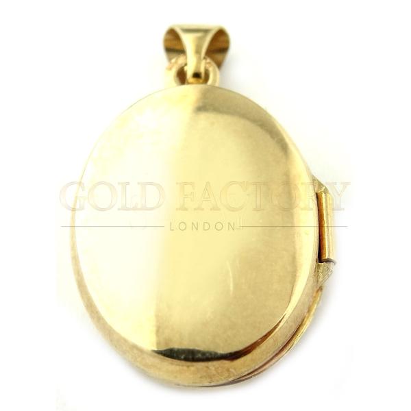 Oval Gold Locket With Dog Motif