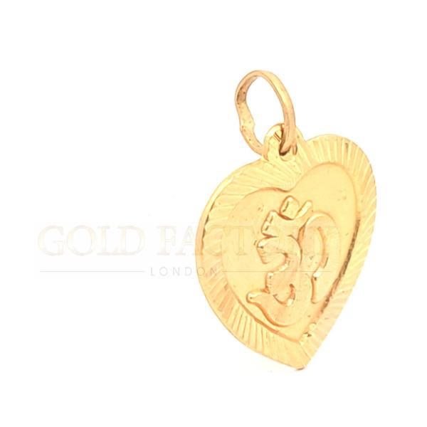 Heart-Shaped Gold Pendant With Om Symbol
