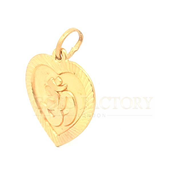 Heart-Shaped Gold Pendant With Om Symbol